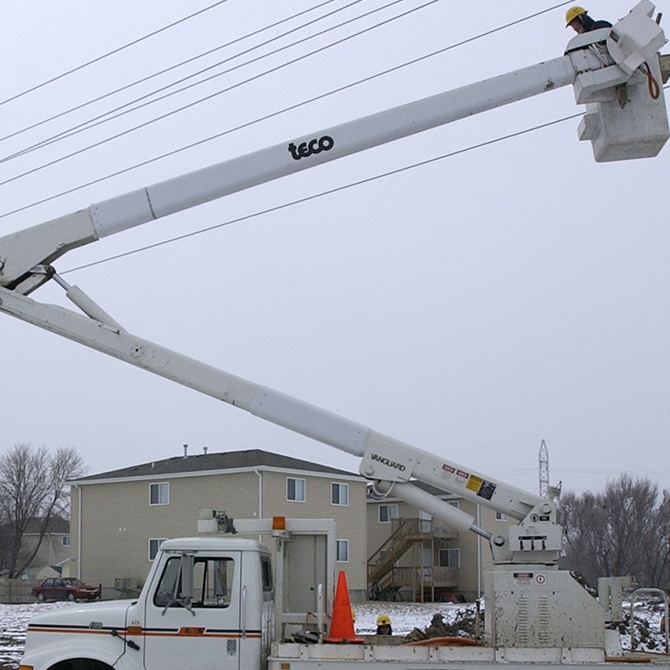 employee working on powerline