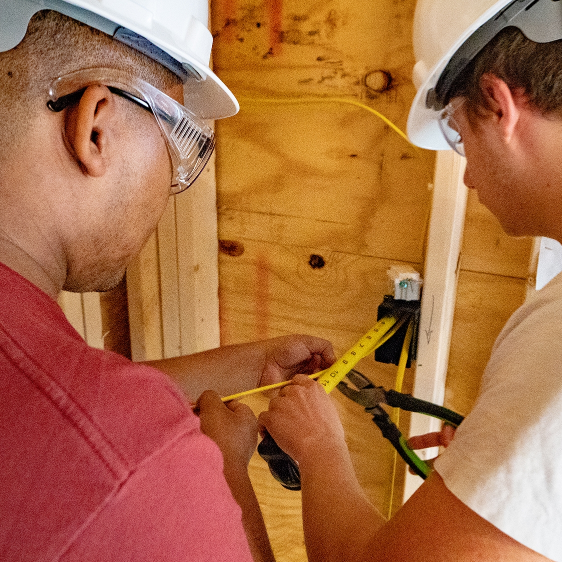 Workers doing measurement